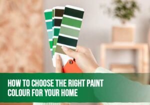 Homeowner comparing paint colour swatches to choose the perfect interior paint for their home.